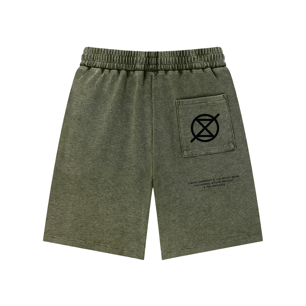Green shorts with a pocket and logo on a white background