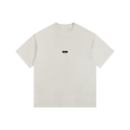 Beige t-shirt with text 'Don't Think About It Too Much' on a white background