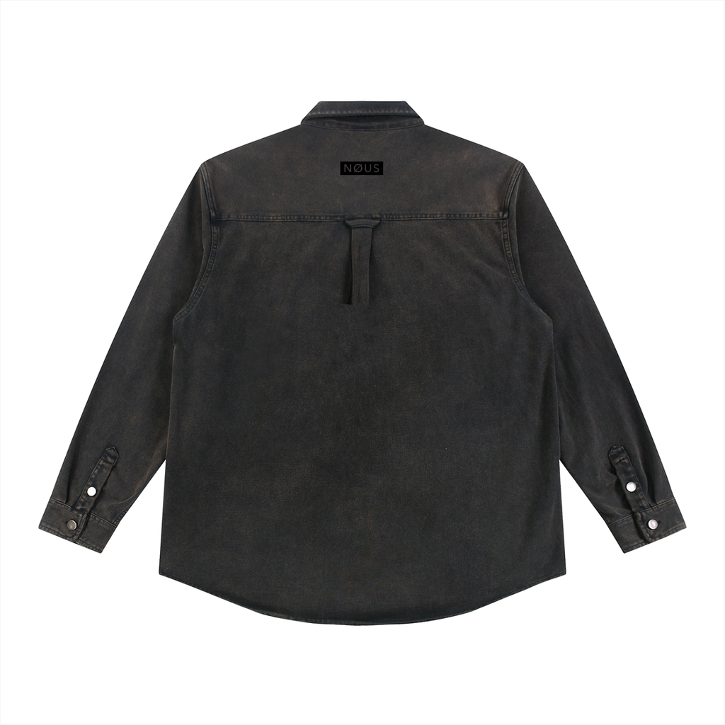 Black shirt with button details on a white background