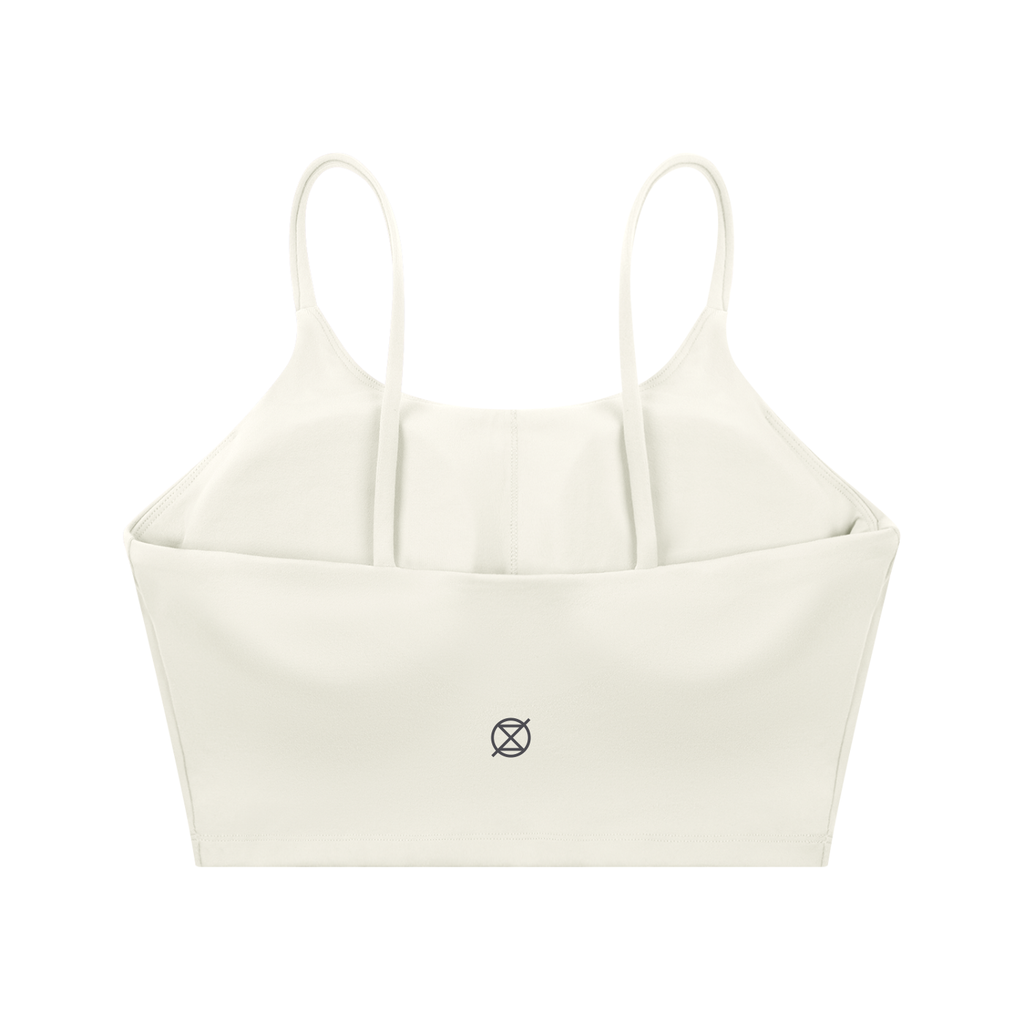 White crop top with thin straps on a white background
