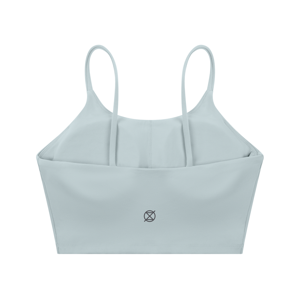 Light blue sports bra with thin straps on a white background